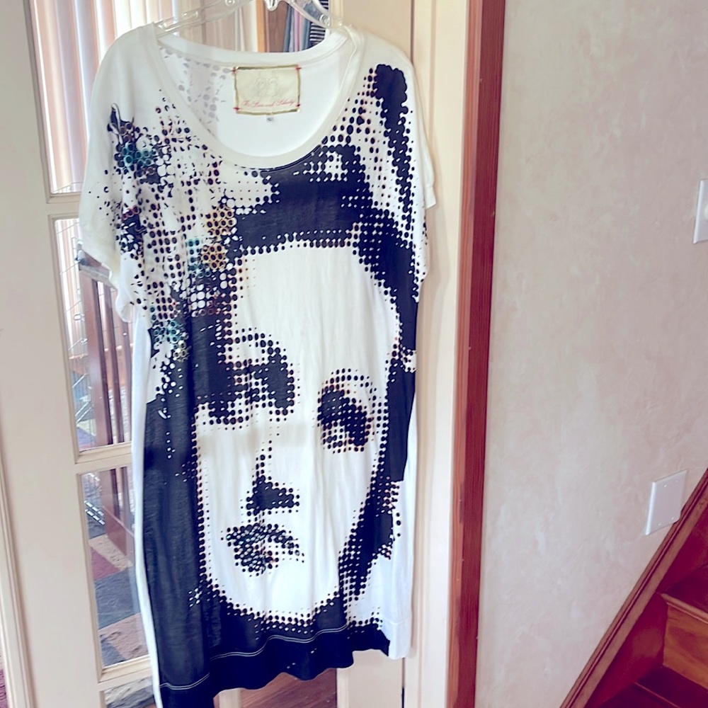 Dress would look great with a belt. Never worn.
